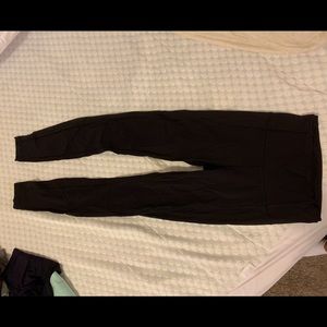 Lululemon size 4 28” black leggings with sheer on sides